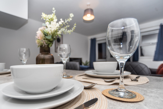 Comfortable dining space ideal for group dinners or work breaks.