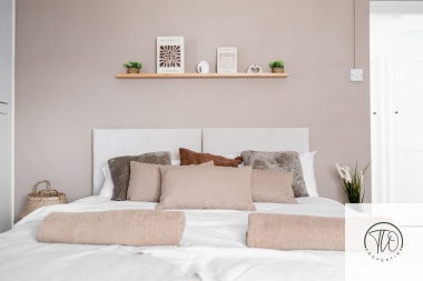 Bedroom is shown in King bed set up. The bed can be split into two singles. 