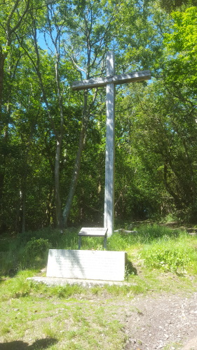 wooden Cross in the forest behind Bossington Hall