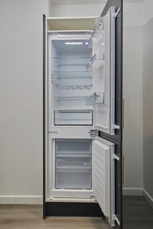 Clean and functional kitchen designed for convenience and ease.