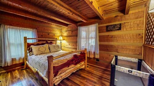 Main Floor Queen Cherry Log Bed Guestroom 2