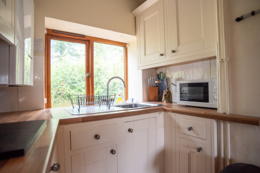 Thoughtfully equipped kitchen area designed for easy self-catering throughout your stay.