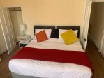 Spacious west facing bedroom with super king bed upstairs