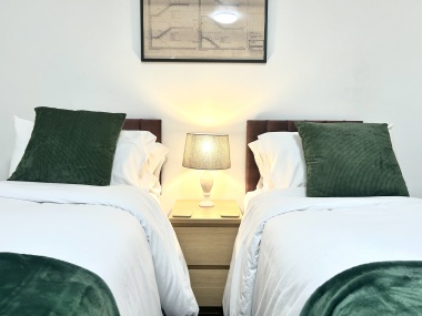 In each room: Microwave, plates, bowls, cutlery, tea, coffee, sugar, biscuits, kettle, mugs, drinking glasses