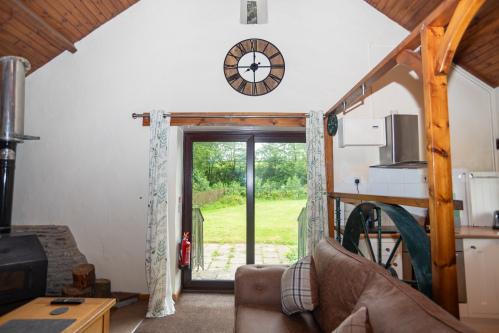 Step Straight into Your Private Garden - Open the double doors from the living room onto your own enclosed patio and lawn, perfect for morning coffee or evening al fresco dining