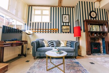 Ralph Lauren wallpaper and Chesterfield in the living room