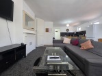 A lounge that works as hard as you do. By day, it's a relaxing space with a Smart TV and dining table. By night, the sofa bed sleeps 2 extra guests.