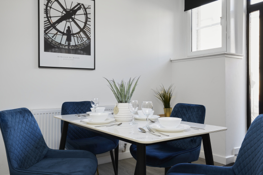 Thoughtfully arranged dining area ideal for breakfast, lunch, or dinner.