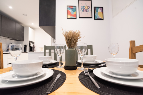 Dining space set for six, perfect for shared meals together.