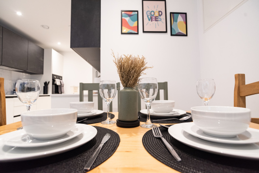 Dining space set for six, perfect for shared meals together.