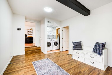 Lg capacity washer/ dryer/ seating area 