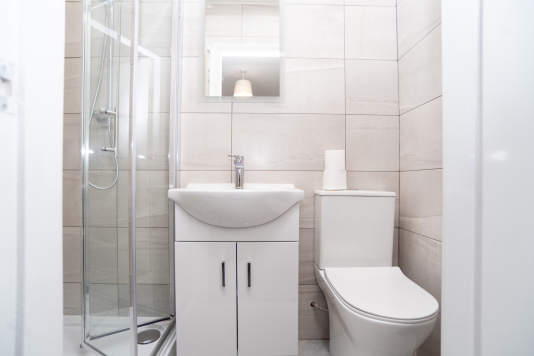 Modern en suite shower room with complimentary toiletries, offering comfort, privacy and convenience