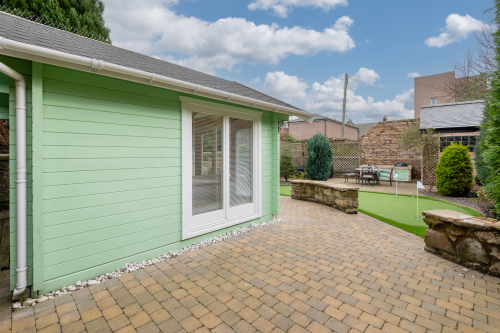 Secret garden with summerhouse and putting green 