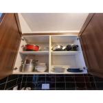 This photo represent the kitchen of the property. 