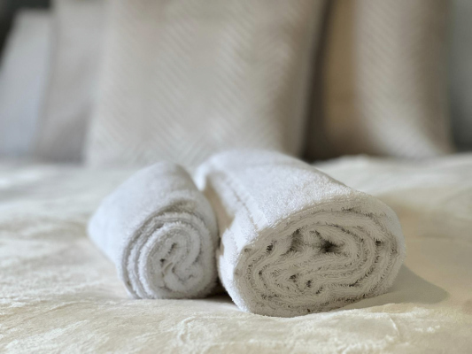 Comfortable bedroom featuring premium bedding for a restful night's sleep.