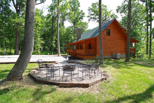 Fire Pit area, looking toward Timberwolf Retreat, with tree in foreground