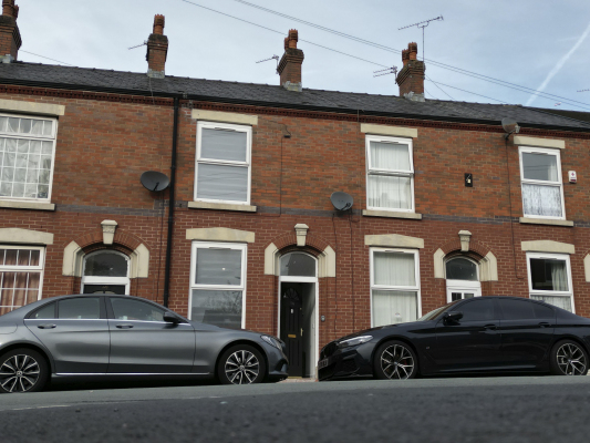 Front of House with on road parking