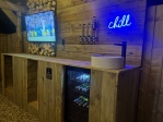 Outdoor bar area and tv 