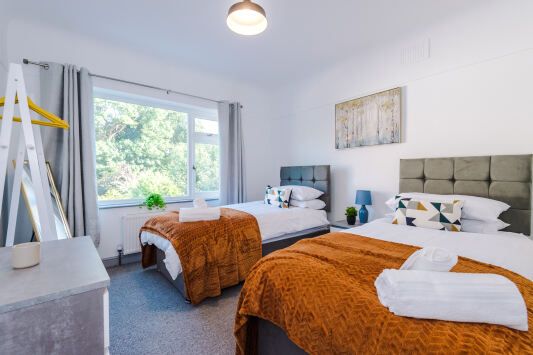 Bedroom 2 - spacious and airy with views of the garden