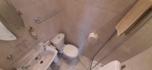 Large Super King Ensuite with Comfy Chairs & Fridge Shower Room