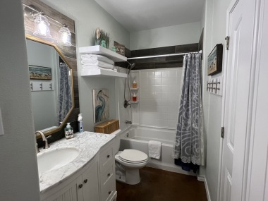 1st flr bath has extra deep tub and a handspray shower head