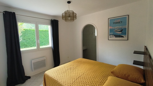 Terrasse couverte accès cuisine et salon