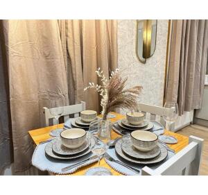 This photo represents the dining table of the property. 