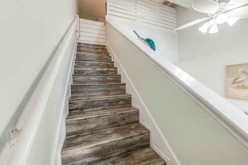 Stairwell has built-in gate at the top 