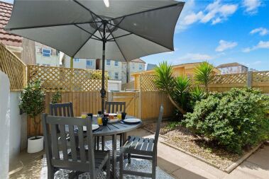 Lovely courtyard garden which is a real suntrap!