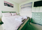 Bedroom 1: Double bed + Chest of drawers