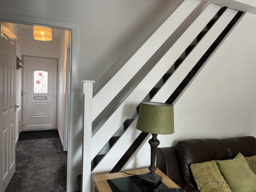 Entrance to Warrington Lane and Stairs to bathroom and 2 bedrooms