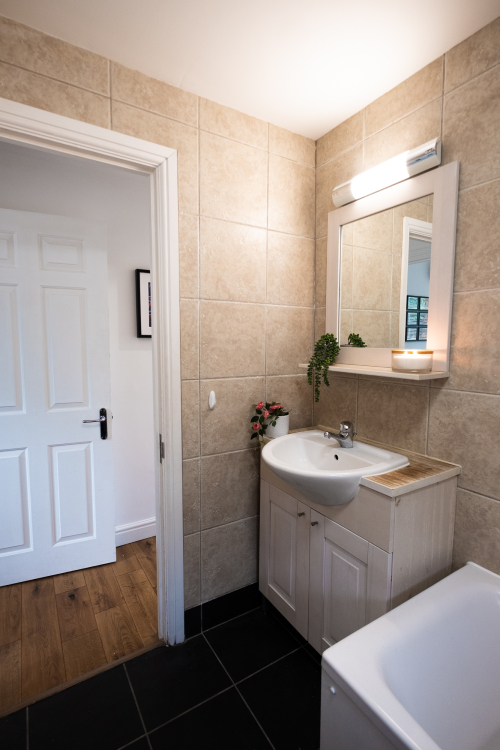 Bathroom sink, mirror and light with shaver power socket