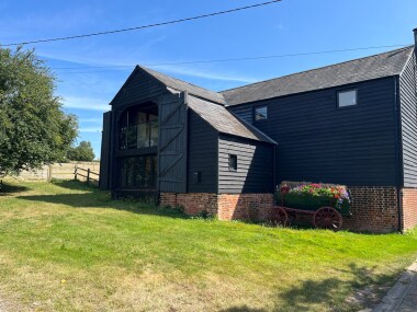 Front with the fields to the side 