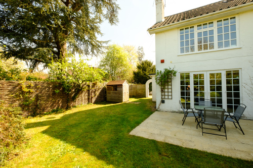 The private and secluded rear garden and terrace.