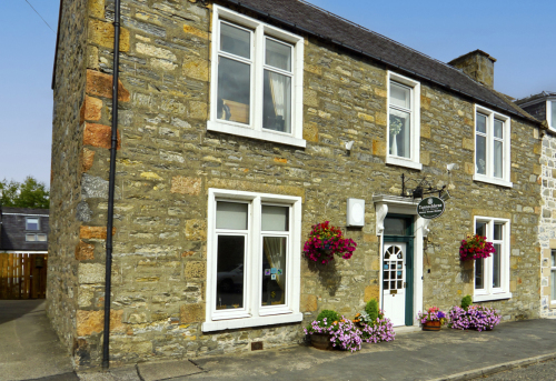 The Tannochbrae showing the side access to its private courtyard, and access to owners cottage to rear of property
