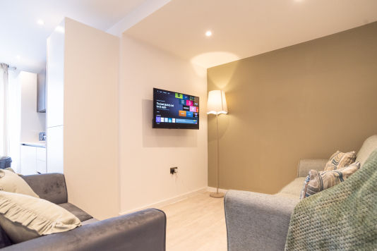 Comfortable lounge area with Smart TV for relaxing evenings.