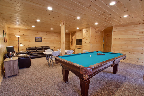 Pool Table, Folding Table w/Chairs, Sitting/Entertainment Area (No TV access - Bring DVD's), lower level