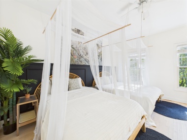 A bright bedroom that feels light and inviting.