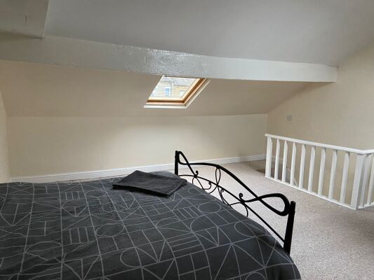Delightful attic sunroom with double bed