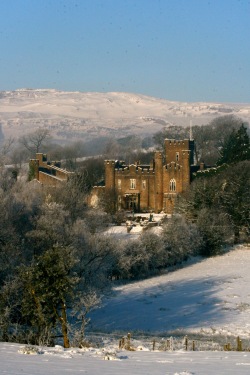 Augill Castle in a snowy landscape