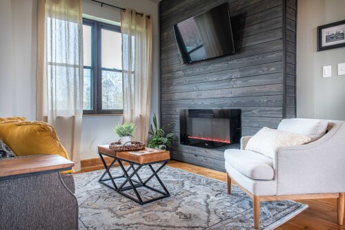 Cozy living room with LED fire place.  