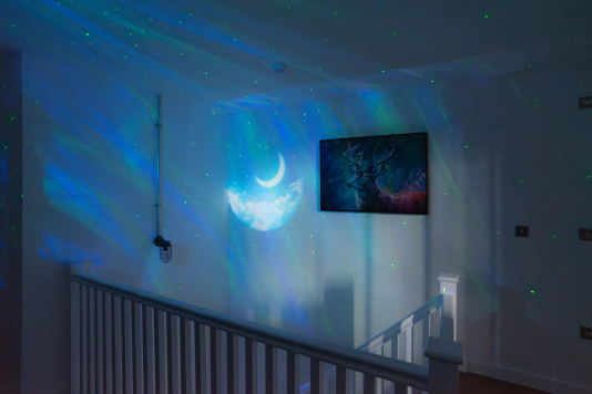 Upstairs features modern projector-style lighting loved by both children and adults, with three stylish double bedrooms on this level, including one with a private en suite.