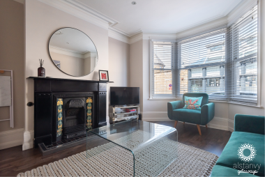 Original sash bay window's flood the room with light