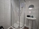 A private bathroom with a powerful shower is a must-have for any stay. We've kept it simple, spotless, and fully equipped with towels and essentials – so you can travel light and feel right at home.
