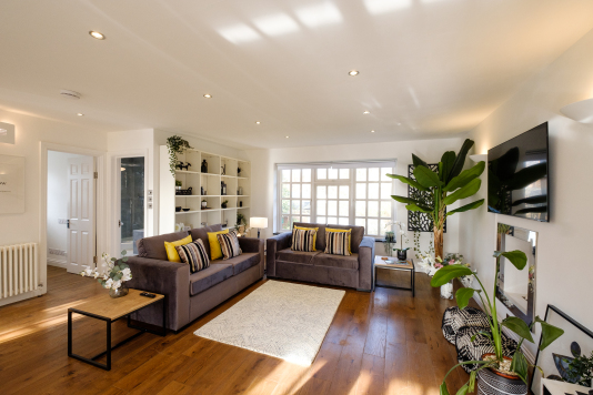The stunning open-plan living/dining/kitchen area has solid-oak flooring and large double aspect windows which flood the space with light. The sofa bed converts to a comfortable double bed for larger groups of guests.