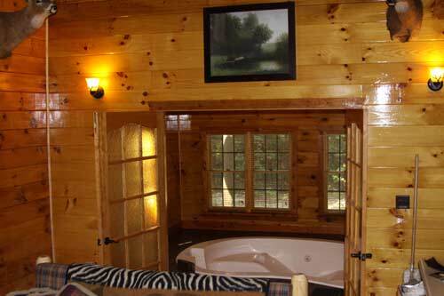 view of indoor hot tub from great room holds 6-8 people  