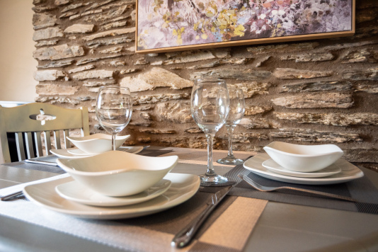 Gather around the dining table for leisurely breakfasts and cosy evening meals after a day on the Devon coast.