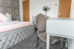 Super kingsize bedroom with dressing table