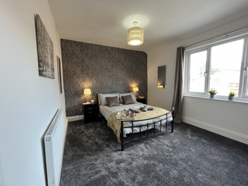 Bedroom 2 - Spacious and stylish bedroom with comfy double bed.