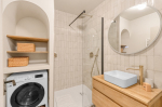 salle de bain avec rangement + lave linge 